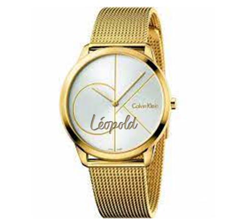 CK: dorée avec gravure personnalisé.